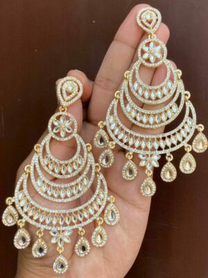 Beautiful kundan earrings which are made of alloy material with a silver Plated on them. embellished with artificial stones and beads