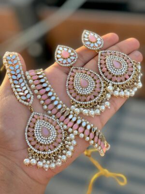 Melon pink necklace and earring and tikka set, made by Kundan Pearls, a mirror and layer brass, copper and gold plated top